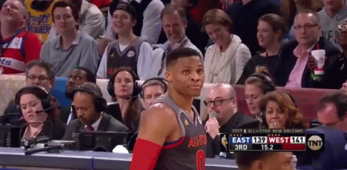 Basketball Player in Front of Crowd