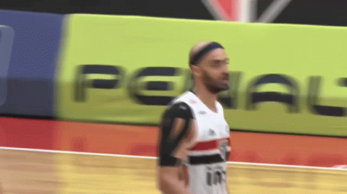 Basketball Player in Front of Penal Banner