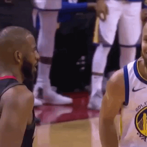 Basketball Player in Golden State Jersey Talking