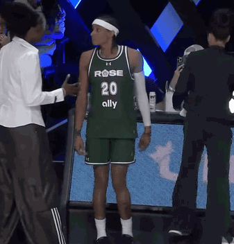Basketball Player in Green Jersey Number 20 Ally