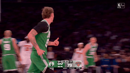 Basketball Player in Green Jersey Number 55