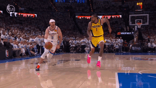 Basketball Player in Indiana Jersey Dribbling