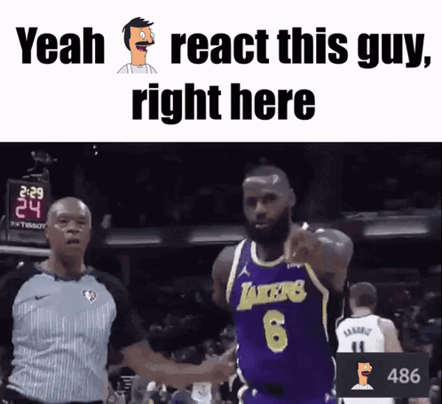 Basketball Player in Lakers Jersey Next to Referee