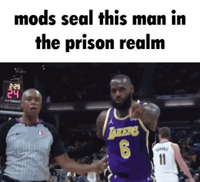 Basketball Player in Lakers Jersey Pointing at Referee
