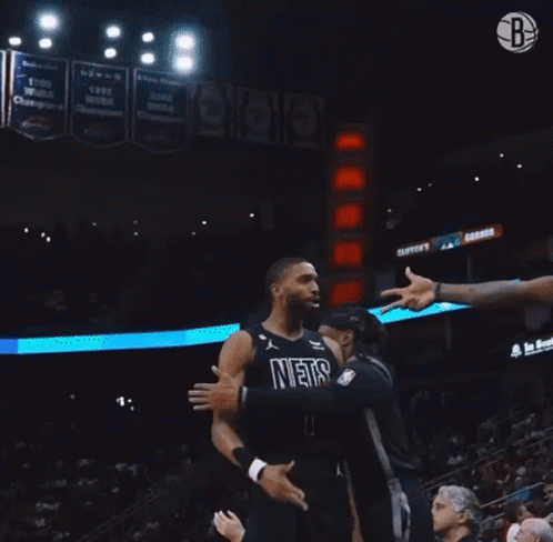 Basketball Player In Number 1 Jersey With Hands Behind Back GIF