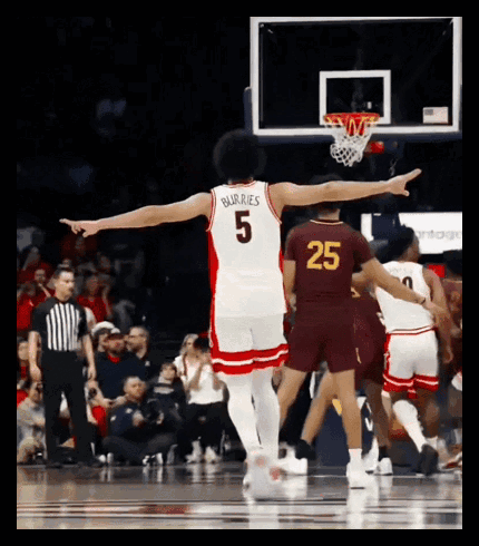 Basketball Player in Number 5 Jersey Pointing