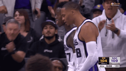Basketball Player In Number 8 Jersey In Front Of Crowd GIF