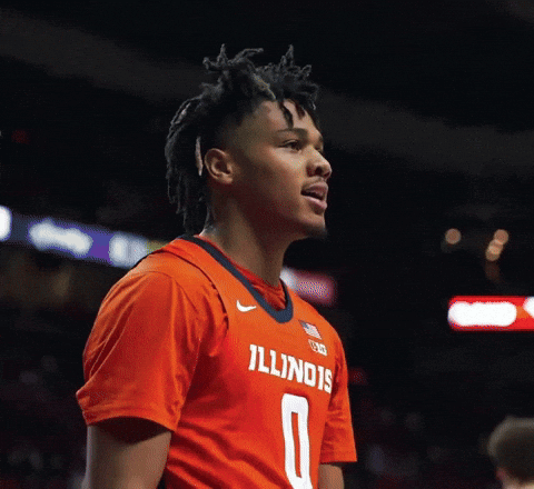 Basketball Player in Orange Illinois Jersey