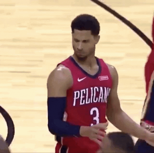 Basketball Player in Pelican Jersey on Court