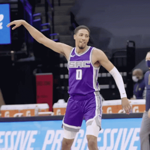 Basketball Player In Purple Jersey Number 0 GIF