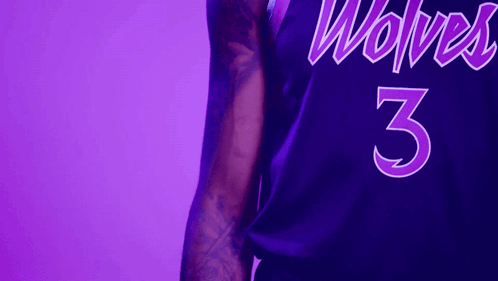Basketball Player in Purple Jersey Number 3