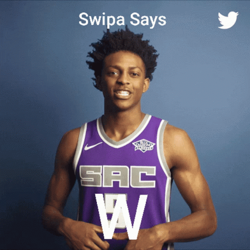 Basketball Player in Purple Jersey With SAC W