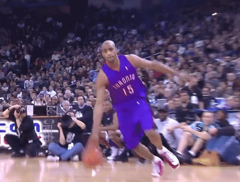Basketball Player in Purple Number 15 Jersey