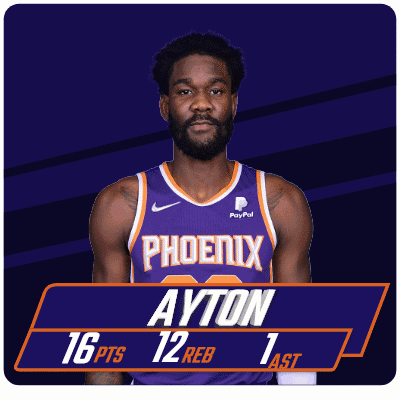Basketball Player in Purple Phoenix Jersey