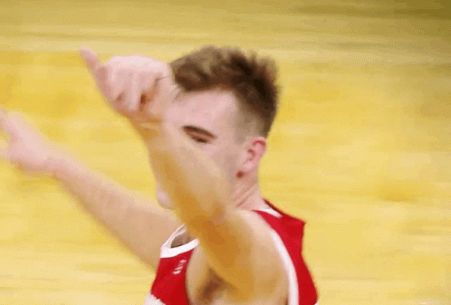 Basketball Player in Red Brooklyn Jersey