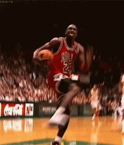 Basketball Player In Red Jersey 23 Jumping With Basketball GIF