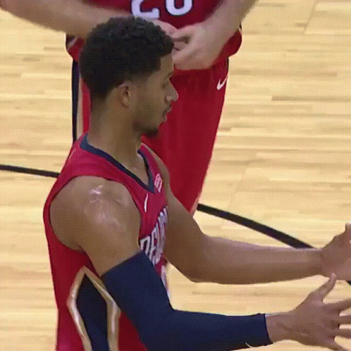 Basketball Player in Red Jersey Number 20
