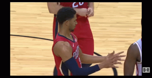 Basketball Player in Red Jersey Number 9