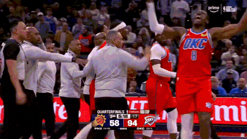 Basketball Player in Red OKC Jersey Arms Up