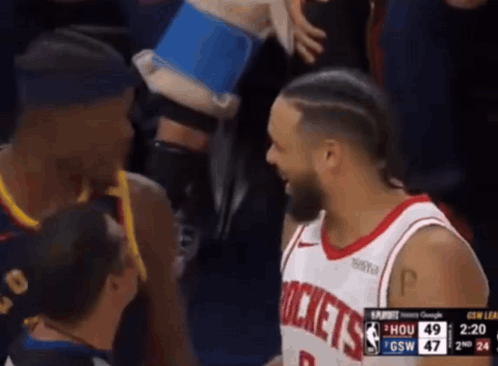 Basketball Player in Rockets Jersey Talking
