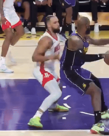Basketball Player in Rockets Jersey