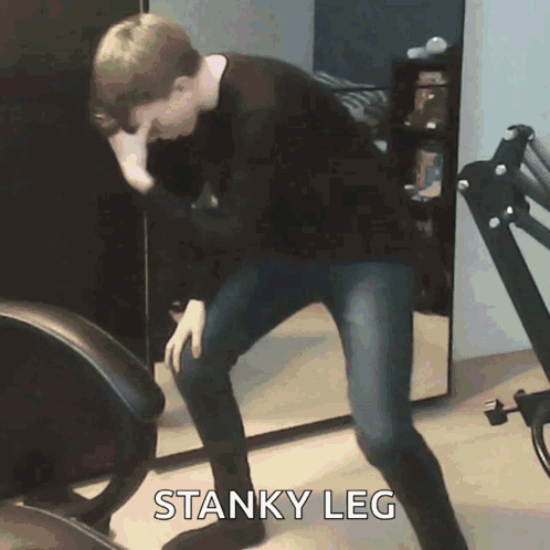 Basketball Player In Spurs Jersey Sitting Down GIF