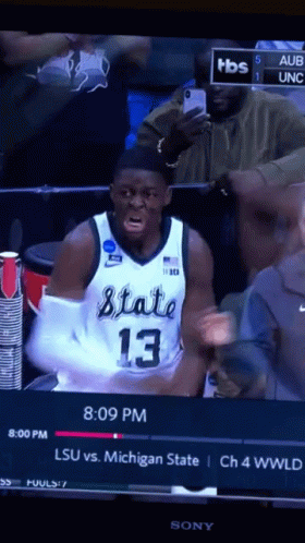 Basketball Player in State Jersey