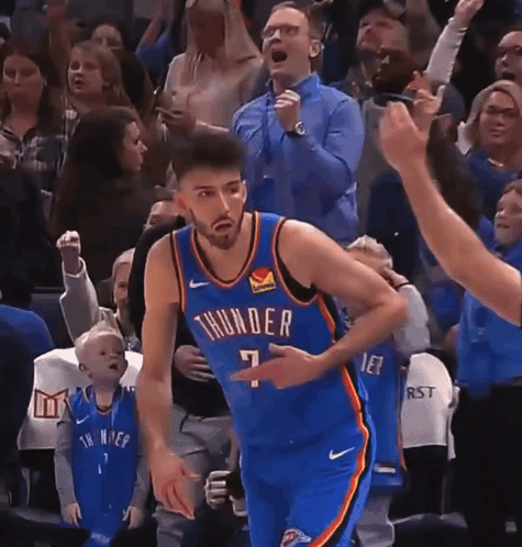 Basketball Player in Thunder Jersey Running