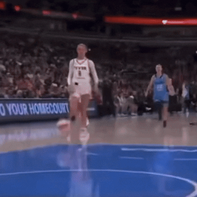 Basketball Player in White Jersey Number 9
