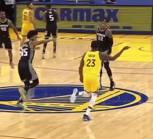 Basketball Player in Yellow Jersey 23 Running