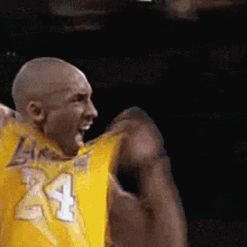 Basketball Player in Yellow Jersey Fist Pump