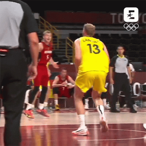 Basketball Player in Yellow Jersey Number 13