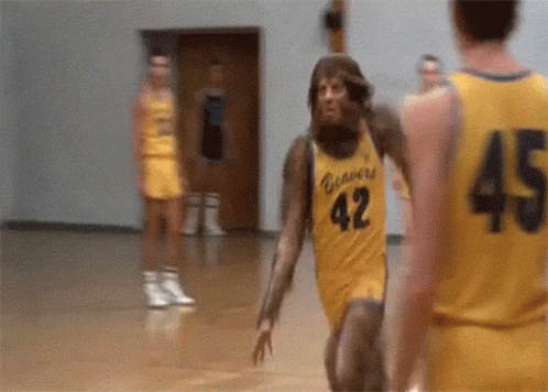 Basketball Player in Yellow Jersey Number 42