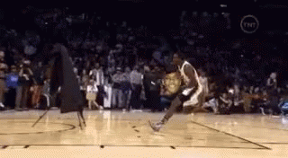 Basketball Player Jumping Dribbling GIF