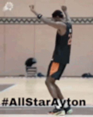 Basketball Player Jumping Hands Up