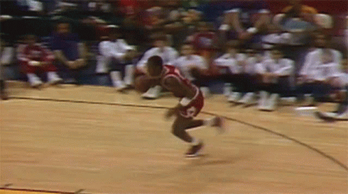 Basketball Player Jumping in Front of Crowd Saying Smart