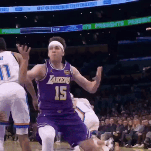 Basketball Player Jumping In Purple Lakers Jersey GIF