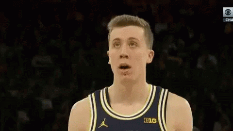Basketball Player Looking Up at Sky