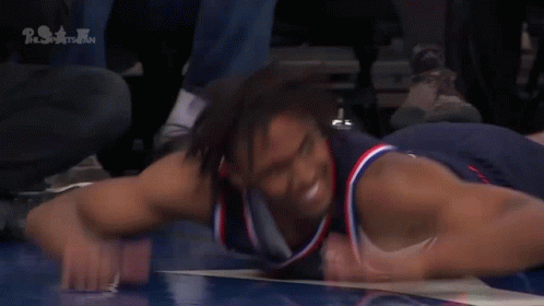 Basketball Player Lying On Floor With PST GIF