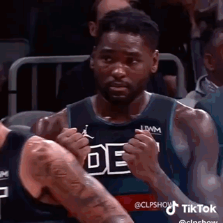 Basketball Player Making Funny Face In Stands GIF