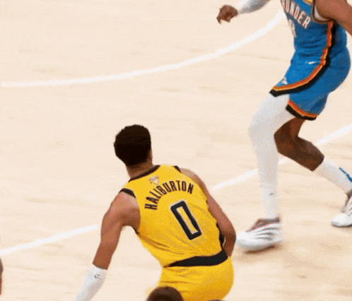 Basketball Player Number 0 Dribbling GIF