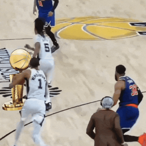 Basketball Player Number 1 Holding Trophy GIF