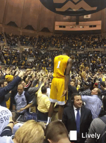 Basketball Player Number 1 in Front of Crowd