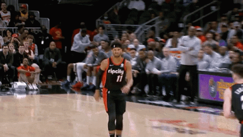 Basketball Player Number 11 Walking