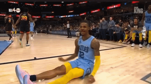 Basketball Player Number 12 Sitting