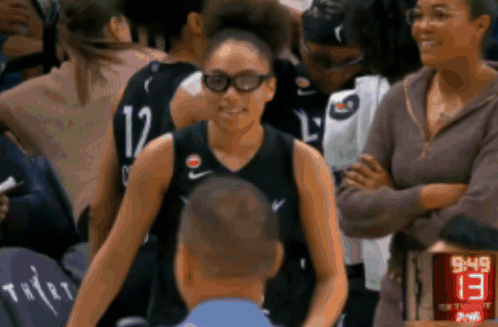 Basketball Player Number 12 Talking To Man GIF