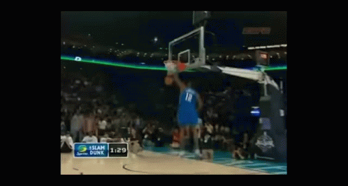 Basketball Player Number 18 Dunking
