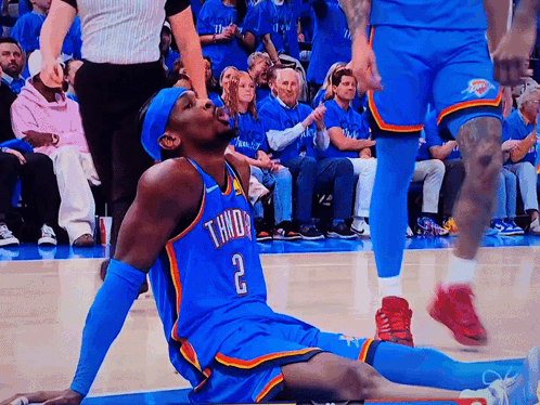 Basketball Player Number 2 Laying on Floor