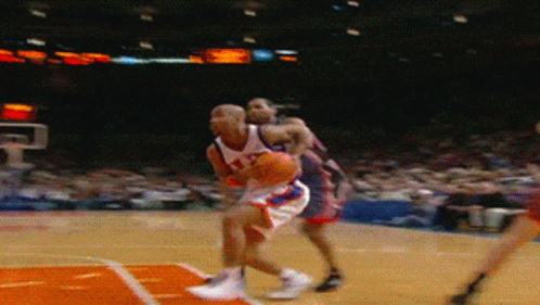 Basketball Player Number 21 Dribbling