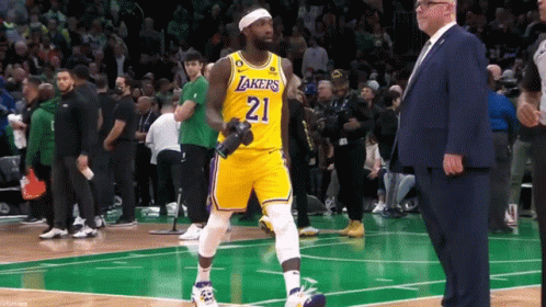 Basketball Player Number 21 Walking GIF